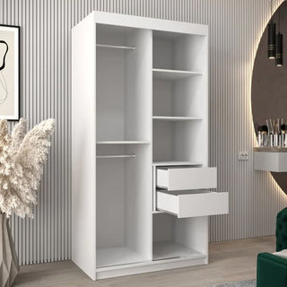 The CHOICEWARDROBE Tavira II 100cm Mirrored Sliding Door Wardrobe in white features a modern 2-door design with shelves and drawers, perfect for efficient storage in bedrooms with light wood floors and contemporary decor.