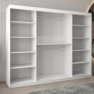 The CHOICEWARDROBE Tavira II 3 Door Mirrored Sliding Wardrobe in white (250cm) features full mirror panels and interior storage, offering stylish sliding door wardrobe inspiration for modern rooms with light wood flooring and gray rugs.