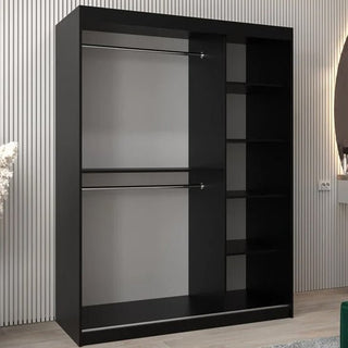 The CHOICEWARDROBE Tavira III black mirrored wardrobe (150 cm, 2 sliding doors) features full-length mirrors, storage shelves on the right, and hanging rails on the left, set against a wall with vertical stripes in a modern room.