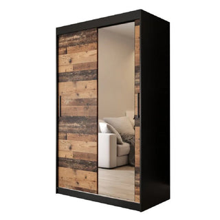 The CHOICEWARDROBE Topeka 120cm Dark Oak & Black 2 Door Sliding Mirrored Wardrobe offers sleek, modern industrial style and smart bedroom storage, featuring one dark oak panel door and one full-length mirror to reflect your space.