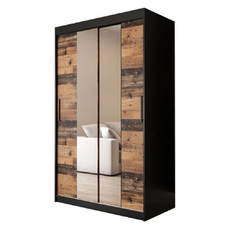 The CHOICEWARDROBE Topeka 120cm Dark Oak & Black Sliding Wardrobe features 2 mirrored doors and a wood panel design, adding modern industrial style and spacious storage to your bedroom.