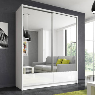 ChoiceWardrobe Valero 184cm High Gloss White Mirrored Sliding Door Wardrobe styled in a contemporary bedroom with reflective finish.