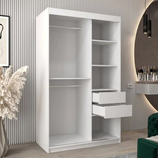 The CHOICEWARDROBE Vevey 2 Door Mirrored Sliding Wardrobe in a 120cm white finish features chrome detailing, full-length mirror, hanging rail, and shelving, offering modern bedroom storage that complements contemporary décor.