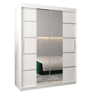 The CHOICEWARDROBE Vevey 2 Door Mirrored Sliding Wardrobe in white (150cm) features recessed handles, full-length mirrors reflecting bedroom décor, hanging rails, adjustable shelves, and a minimalistic design for modern bedroom storage.