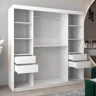 The CHOICEWARDROBE Vevey 2 Door Sliding Wardrobe (200cm, white with chrome detailing) features spacious shelving and a hanging rail, standing in a modern room with light wood flooring and striped wall paneling.