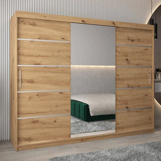 The CHOICEWARDROBE Vevey 3 Door Sliding Mirrored Wardrobe (250cm Oak Finish) features a modern triple-panel design, full-length mirror, hanging rails, and adjustable shelves—offering style and storage for contemporary bedrooms.