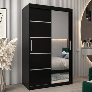 The CHOICEWARDROBE Vevey Black Mirrored Sliding Wardrobe features a sleek 120cm 2 door design with silver accents, high-gloss finish, shelves, rails, and a full-length mirror—perfect for stylish storage in a modern bedroom.