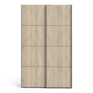 The CHOICEWARDROBE Vrok 120cm Sliding Door Wardrobe features a modern white and oak two-tone finish, smooth glide doors, and generous storage, offering a sleek Scandinavian look that highlights natural wood tones.