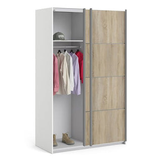 The CHOICEWARDROBE Vrok Oak & White Sliding Wardrobe (122 cm, 2 Door) showcases a modern dual-tone design with shelves, a hanging rail for clothes, and space for shoes, blending minimalist style with practical storage.
