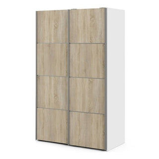 The CHOICEWARDROBE Vrok Oak & White Sliding Wardrobe is a 122 cm modern rectangular robe with two sliding doors in a light wood grain and white dual-tone finish, featuring shelves, a hanging rail, and rectangular panel design.