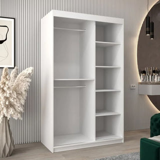 The Eden Mirrored Wardrobe 2 Sliding Doors 120cm in White features two hanging rods and five shelves, blending seamlessly into a modern room with light wood floors and striped wall paneling—perfect for stylish bedroom storage.