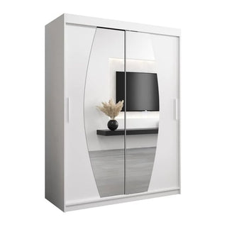 The Eden Mirrored Wardrobe 2 Sliding Doors 150cm in Artisan Oak features large curved mirrors reflecting a wall-mounted TV, shelf, and vase with dried plants in a modern room.