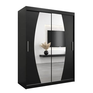 The Eden Mirrored Wardrobe 2 Sliding Doors 150cm in Black features large vertical mirrors and metal handles, reflecting a modern room with light gray flooring and a wall-mounted TV—perfect for stylish contemporary bedrooms.