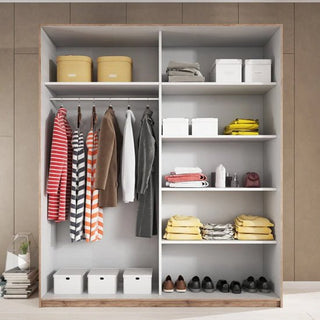 A neatly organized Gitega Wooden Wardrobe 2 Sliding Doors 220cm in Matt White with striped and solid shirts and jackets hanging on the left, boxes and folded clothes on right shelves, plus extra storage boxes on top and bottom shelves.