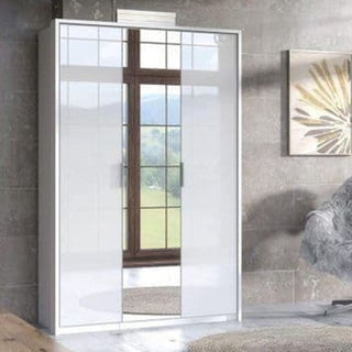 White high gloss 3 door wardrobe with one mirrored door reflecting a window