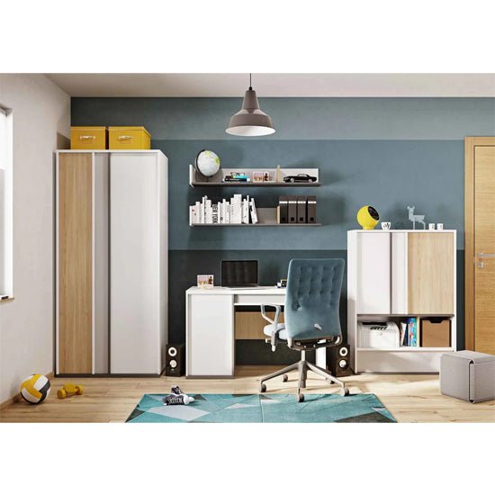 Modern home office with white desk, blue chair, and two-tone storage cabinets including Indio Kids Wardrobe, shelves, rug.