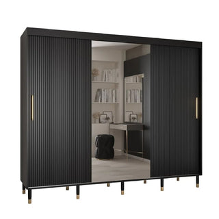 Angled view of Millwall sliding wardrobe highlighting gold handles, black panel texture, and mirrored centre.