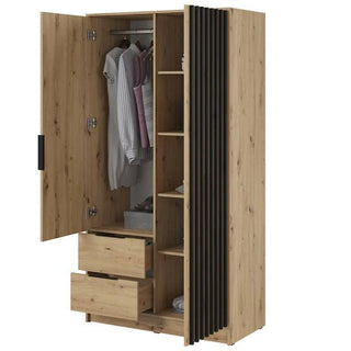 A compact bedroom storage solution, the Newberry Mirrored Wardrobe With 2 Hinged Doors 105cm in Artisan Oak features open shelves, two partially open drawers, a clothes rail, and a gray storage box on one shelf.
