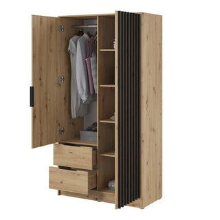 The Newberry Wooden Wardrobe With 2 Hinged Doors 105cm in Artisan Oak reveals hanging clothes, shelves, and two open drawers at the bottom. It features a natural oak finish with vertical black accents on the right side.