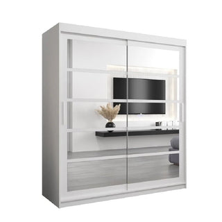 The Reston Mirrored Wardrobe With 2 Sliding Doors In White reflects a modern living room featuring a wall-mounted TV, floating shelf, and a vase with dried plants.