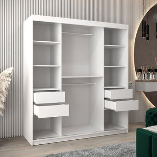 The Reston Mirrored Wardrobe With 2 Sliding Doors in white offers open shelves, two hanging rods, and four drawers, blending perfectly in a contemporary room with striped walls, a round mirror, and stylish decor.