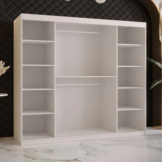 White sliding door wardrobe with mirrored panel, shelves and hanging rails
