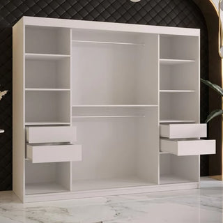 The Rieti II Mirrored Wardrobe with 2 sliding doors in white (200cm) features multiple open shelves and four pull-out drawers, combining style and functionality. It stands on a marble floor against a black quilted wall.