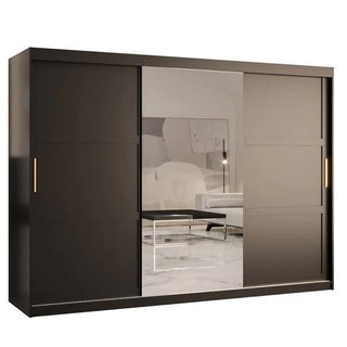 The Rieti II Mirrored Wardrobe 2 Sliding Doors 250cm in Black adds a modern touch, its central mirror reflecting a minimal living room with a white sofa and glass coffee table.