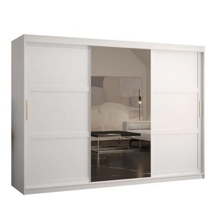 The Rieti II Mirrored Wardrobe features two sliding doors in white with subtle panel detailing and recessed handles. One door is a large mirror, perfect for reflecting your contemporary space and amplifying light.