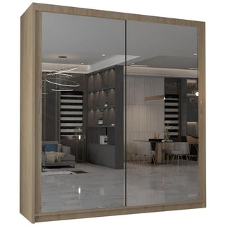 The CHICAGO II 2 Door Mirrored Wardrobe in oak (203cm) stylishly reflects a modern living or dining area with gray furniture, marble floors, and contemporary lighting—perfect for elegant bedroom storage.