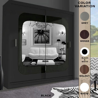 The COVINA 2 Door Mirrored Sliding Wardrobe (150cm) in black features large mirrored doors that reflect room decor. Available color options: grey, wenge, black & white, walnut, and white—perfect for stylish bedroom storage.