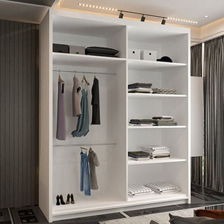 The COVINA 2 Door Mirrored Sliding Wardrobe in white (150cm) provides bedroom storage for hanging clothes, shelves for folded items and shoes, plus space on top for boxes, perfect for modern rooms with large windows and track lighting.