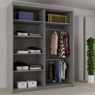 The HEFFNER 2 Door Mirrored 180cm Sliding Wardrobe in grey features shelves for folded clothes, space for boxes, suitcases on top, and a hanging section for jackets, dresses, shirts, and pants—ideal bedroom storage with modern style.