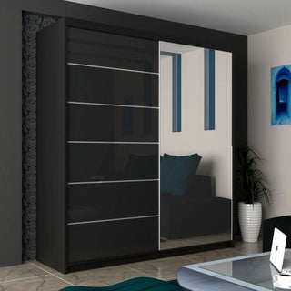 The INFINITE 2 Door Mirrored Wardrobe Black - 150cm, a modern high gloss sliding wardrobe with one mirrored panel, adds stylish storage to a contemporary room, reflecting decor like wall art, a plant, and a blue-cushioned sofa.