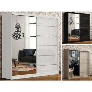 The INFINITE 2 Door Mirrored Wardrobe Black (150cm) is featured in a modern room with geometric walls and contemporary furniture, stylishly reflected in its sliding mirrored doors.