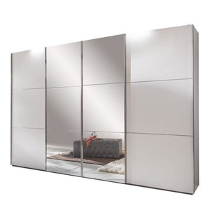 The LANDSCAPE 4 Door Mirrored Wardrobe in white (350cm) features a modern design with mirrored doors that reflect a tufted bench, fur rug, and wooden floor—ideal for any contemporary bedroom.