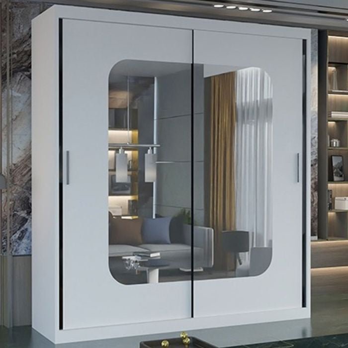 MERICA 120cm white sliding wardrobe with mirrored doors reflecting the room.