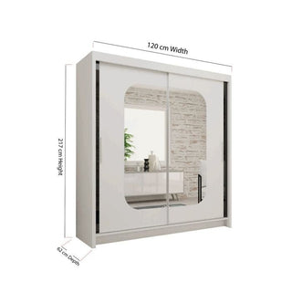 The Sliding Wardrobe - MERICA 2 Door Mirrored Wardrobe White - 120cm, measuring 120x217x62cm, is shown with mirrored doors reflecting a brick wall and shelves, making it an ideal stylish storage solution for your bedroom.
