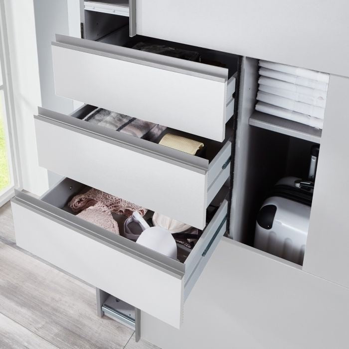 SOGO 225cm sliding wardrobe showing three open drawers with clothes and a suitcase to the right.