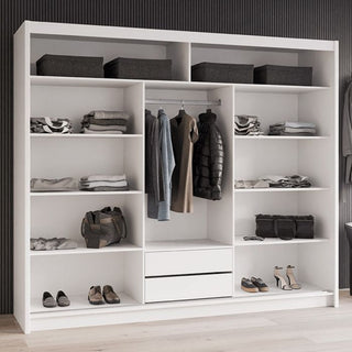 ROTHERHAM 250cm white 3-door sliding wardrobe interior with shelves, hanging rail, drawers, and shoe storage.