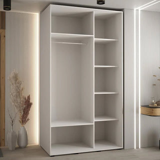 Open white wardrobe interior with hanging rail and multiple shelves