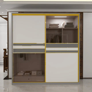 Modern sliding wardrobe in white with golden trim and visible LED lights, featuring a glass door section.