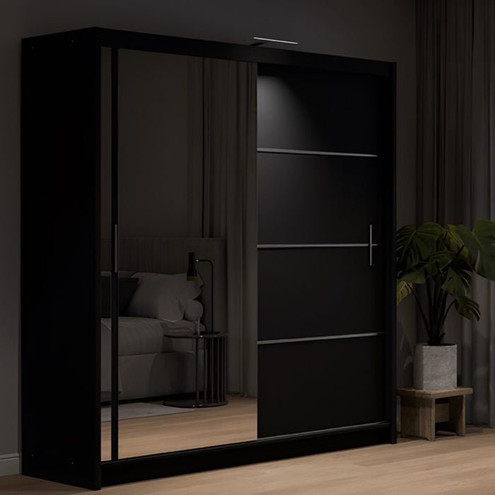 Black two-door sliding wardrobe with a mirrored door
