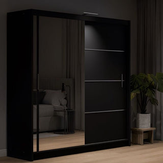 Black two-door sliding wardrobe with a mirrored door
