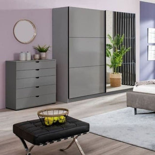 Grey 2-door sliding wardrobe with mirrored door and chest of drawers