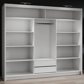 White 3 door sliding wardrobe with mirrored doors, showing shelves and drawers interior