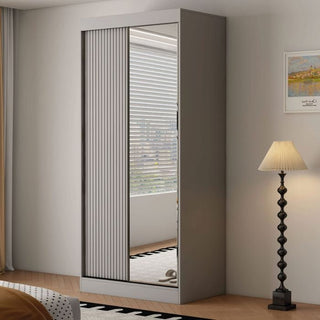 Grey 2-door sliding wardrobe with a full-length mirrored door and grooved panel detail.
