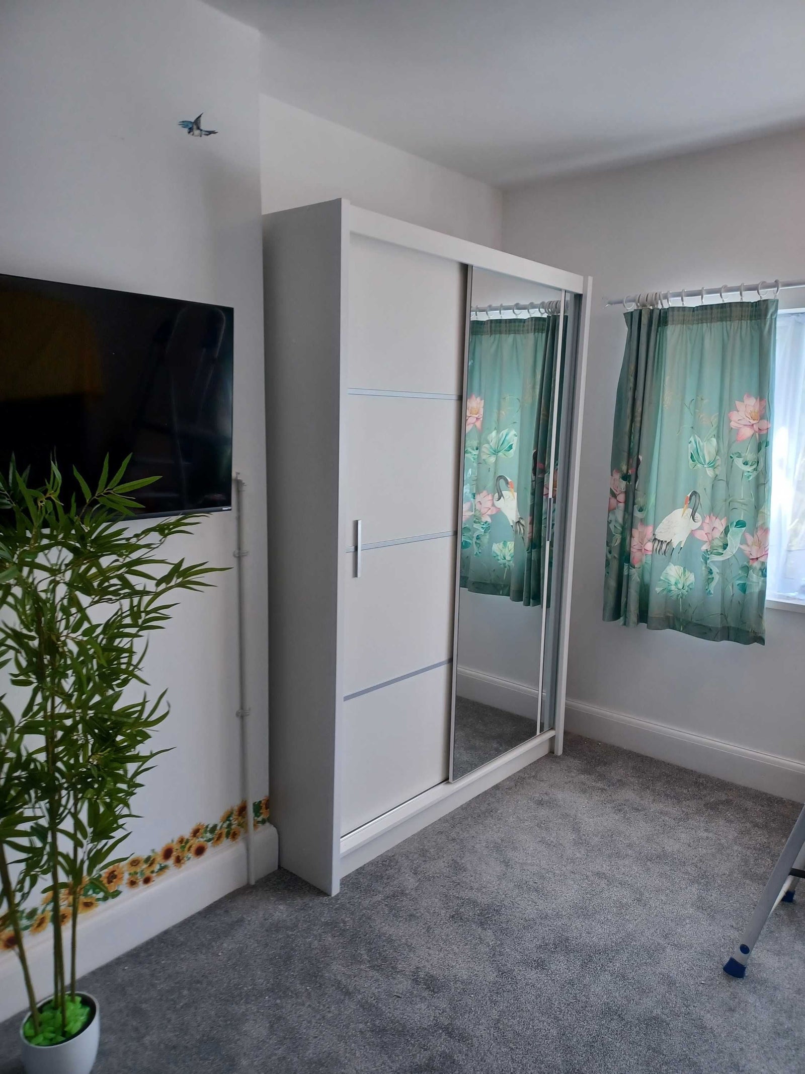 White 2 door sliding wardrobe with mirrored front