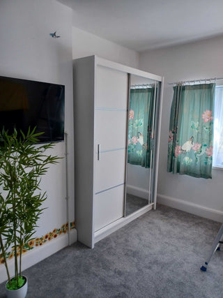 White 2 door sliding wardrobe with mirrored front