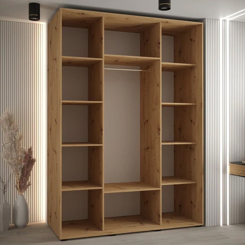 Open artisan oak wardrobe interior with shelves and hanging rail